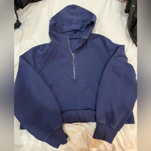 Lululemon navy blue scuba quarter zip, small stain.